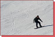 Bormio, San Colombano. Snowboardista na tvrd pist 