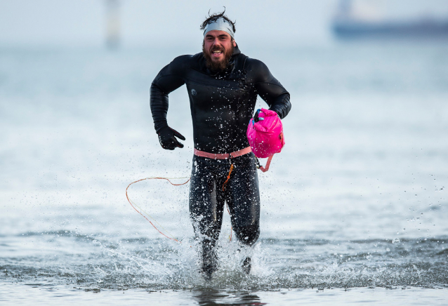 Strongman Ross Edgley swims into shore after 157 days and 2,000 miles at sea