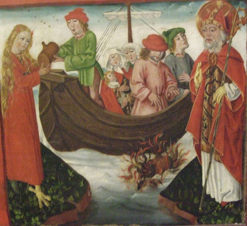 Svatý Mikuláš pomocí hořícího oleje na hladině objevuje ďábla v podobě ženy Diany.